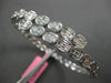 2.67CT DIAMOND 18K WHITE GOLD OVAL BEZEL INVISIBLE SEMI ETERNITY BANGLE BRACELET