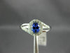 ESTATE .40CT DIAMOND & AAA TANZANITE 14KT WHITE GOLD CLASSIC LOVE KNOT FUN RING