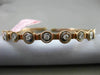 ESTATE .60CT DIAMOND 14KT WHITE & ROSE GOLD 3D 9 STONE FLEXIBLE BANGLE BRACELET