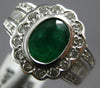 WIDE 2.19CT DIAMOND & EMERALD 18KT WHITE GOLD OVAL ROUND & BAGUETTE FLOWER RING