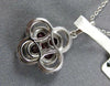 .84CT DIAMOND & AAA RUBY 18KT WHITE GOLD INVISIBLE DOUBLE 4 LEAF CLOVER PENDANT