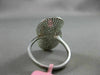 ESTATE LARGE .88CT ROUND DIAMOND 18K WHITE GOLD 3D PAVE INFINITY OVAL LOVE RING