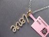 ESTATE .16CT DIAMOND 14KT YELLOW GOLD 3D CLASSIC SCRIPT LOVE FLOATING PENDANT