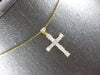 0.60CT DIAMOND 14KT YELLOW GOLD 3D ROUND & BAGUETTE CROSS FLOATING PENDANT #27885