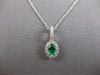 .56CT DIAMOND & AAA COLUMBIAN EMERALD 14KT WHITE GOLD OVAL HALO FLOATING PENDANT