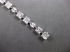 4.22CT DIAMOND 18KT WHITE GOLD ROUND BAGUETTE & MARQUISE SQUARE TENNIS BRACELET