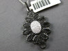 LARGE 1.33CT WHITE & BLACK DIAMOND 14KT WHITE GOLD OVAL FLOWER FLOATING PENDANT