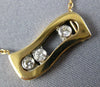 ESTATE .17CT DIAMOND 18KT WHITE & ROSE GOLD 3 STONE ETOILE FLOATING LOVE PENDANT