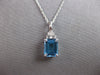 2.58CT DIAMOND & AAA BLUE TOPAZ 14KT WHITE GOLD 3D EMERALD CUT & ROUND PENDANT