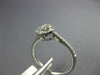 ESTATE .31CT DIAMOND 18KT WHITE GOLD 3D CLUSTER FLOWER HALO FRIENDSHIP RING