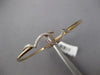 ESTATE .26CT DIAMOND 14KT YELLOW GOLD 3D DOUBLE HEART LOVE KNOT BANGLE BRACELET