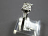 .50CT DIAMOND 18KT WHITE GOLD PRINCESS & BAGUETTE 3D INVISIBLE ENGAGEMENT RING
