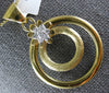 ESTATE .19CT DIAMOND 18KT YELLOW GOLD 3D FLOWER CIRCULAR FUN PENDANT