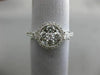 ESTATE .82CT ROUND DIAMOND 18KT WHITE GOLD 3D 4 STONE FLOWER HALO PROMISE RING