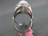 2.87CT DIAMOND 18K WHITE GOLD ROUND & BAGUETTE OVAL CLUSTER CRISS CROSS X RING