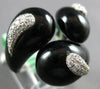 EXTRA LARGE .49CT DIAMOND & AAA ONYX 18KT WHITE GOLD MULTI LEAF CRISS CROSS RING