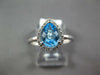 1.17CT DIAMOND & AAA BLUE TOPAZ 14K WHITE GOLD PEAR SHAPE & ROUND HALO LOVE RING