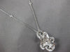 EXTRA LARGE 2.55CT DIAMOND 18KT WHITE GOLD ROUND & BAGUETTE FLORAL LOVE PENDANT