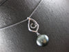 ESTATE LARGE. 15CT DIAMOND & AAA TAHITIAN PEARL 18K WHITE GOLD LOVE KNOT PENDANT