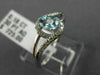 ESTATE .48CT DIAMOND & AAA OVAL CUT AQUAMARINE 14KT WHITE GOLD 3D LOVE KNOT RING