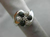 ESTATE WIDE .25CT WHITE & BLACK DIAMOND 14KT WHITE GOLD FLOWER CRISS CROSS RING