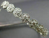 ESTATE .25CT DIAMOND 14K WHITE GOLD CLASSIC MULTI CLUSTER FLOWER BANGLE BRACELET