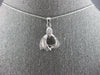 ESTATE .25CT DIAMOND 18KT WHITE GOLD 3D BAGUETTE TRIANGULAR FUN FLOATING PENDANT