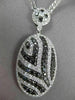 ESTATE LARGE 5.18CT BLACK & WHITE DIAMOND 18KT WHITE GOLD OVAL FLOATING NECKLACE