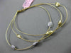 ESTATE .42CT DIAMOND 14KT TWO TONE GOLD HAMMERED BY THE YARD BANGLE BRACELET