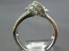 WIDE 1.62CT DIAMOND 18KT WHITE GOLD 3D CLASSIC ROUND & BAGUETTE LOVE KNOT RING