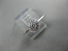 ESTATE .15CT DIAMOND 18KT WHITE GOLD CLASSIC FLOWER HALO BEZEL FRIENDSHIP RING