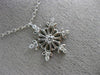 ESTATE .16CT DIAMOND 14KT WHITE GOLD 3D SNOWFLAKE FLOATING LOVE PENDANT