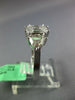 1.28CT DIAMOND 18KT WHITE GOLD MOON CUT & BAGUETTE 3 STONE LOOK ENGAGEMENT RING