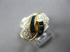 1.20CT DIAMOND & AAA SAPPHIRE 18KT YELLOW GOLD ROUND & BAGUETTE CRISS CROSS RING