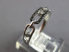 ESTATE .09CT WHITE & BLACK DIAMOND 14KT WHITE GOLD 3D OVAL LOVE KNOT FUN RING