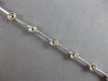 ESTATE .52CT DIAMOND 14K WHITE GOLD ROUND BEZEL BY THE YARD LOVE TENNIS BRACELET