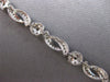 ESTATE 3.10CT DIAMOND 14KT WHITE GOLD MULTI FLOWER INFINITY LOVE TENNIS BRACELET