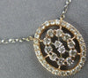 ESTATE .41CT DIAMOND 14KT WHITE AND ROSE GOLD 3D OVAL BY THE YARD LOVE PENDANT