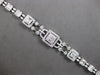 EXTRA LARGE 3.67CT DIAMOND 18KT WHITE GOLD 3D ROUND & BAGUETTE TENNIS BRACELET