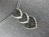 ESTATE .78CT WHITE & BLACK DIAMOND 14KT WHITE GOLD 3D HEART JOURNEY LOVE PENDANT