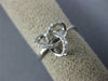 ESTATE .13CT DIAMOND 18KT WHITE GOLD 3D CLASSIC LOVE KNOT FLOWER STAR RING