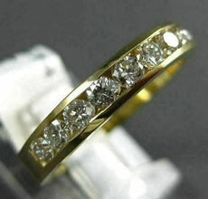 ESTATE .65CT DIAMOND 14KT YELLOW GOLD ROUND CHANNEL ANNIVERSARY RING 3mm 14574