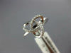 ESTATE .13CT DIAMOND 18KT WHITE GOLD 3D CLASSIC LOVE KNOT FLOWER STAR RING