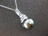LARGE .07CT DIAMOND & AAA TAHITIAN PEARL 14KT WHITE GOLD SWIRL FLOATING PENDANT
