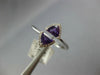 .70CT DIAMOND & AAA AMETHYST 14KT WHITE GOLD TRILLION & ROUND CRISS CROSS RING