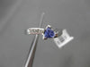 ESTATE .48CT DIAMOND & AAA TANZANITE 14KT WHITE GOLD TRILLION FUN COCKTAIL RING