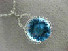 ESTATE LARGE 6.60CT DIAMOND & BLUE TOPAZ 14KT WHITE GOLD HALO ROUND HALO PENDANT