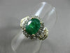 ESTATE 1.82CT ROUND & BAGUETTE DIAMOND & AAA EMERALD 14K TWO TONE GOLD HALO RING