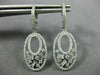 ESTATE .75CT ROUND AND BAGUETTE DIAMOND 14KT WHITE GOLD 3D OVAL HANGING EARRINGS