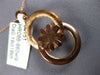 ESTATE .19CT DIAMOND 18KT ROSE GOLD 3D FLOWER CIRCULAR LOVE KNOT FUN PENDANT
